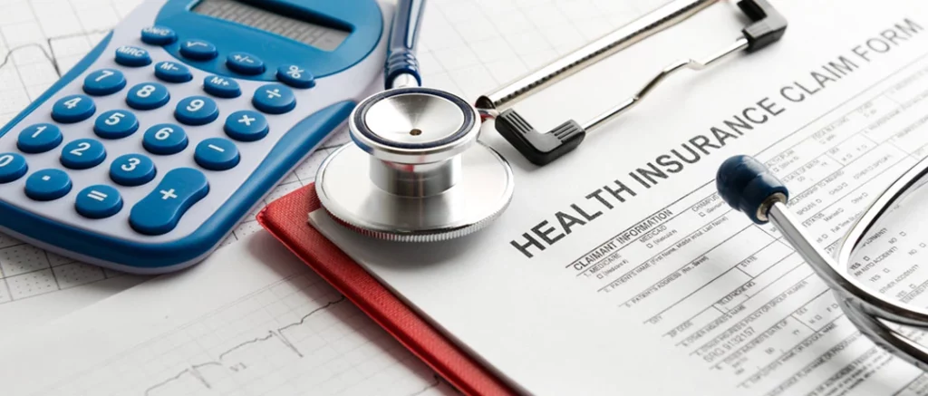 Is IOP covered by insurance? Concept pic shows paperwork and calculator beside a stethoscope
