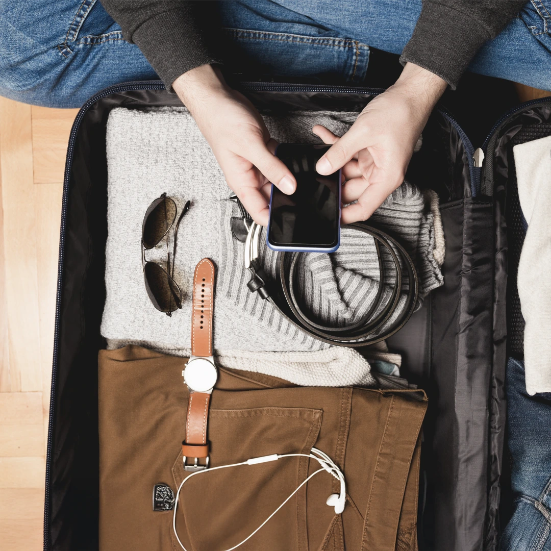 Rehab-Packing-Checklist-At-Changes-Healing-Center A group therapy session with three men seated in a circle, engaging in a supportive conversation in a bright room.