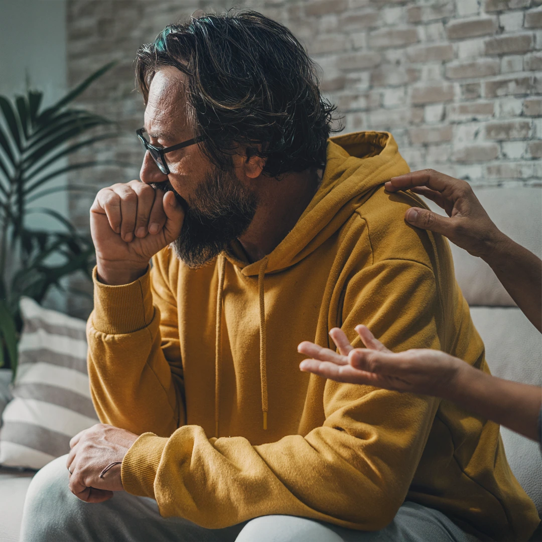Cocaine-Addiction-Treatment-Services-Mobile Man struggling with cocaine addiction receiving compassionate support during counseling session at Changes Healing Center in Phoenix, Arizona.