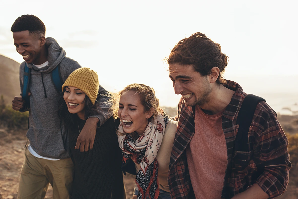 Understanding-Your-Insurance-Coverage-At-Changes-Healing-Center Friends smiling outdoors—peace of mind after understanding insurance coverage.