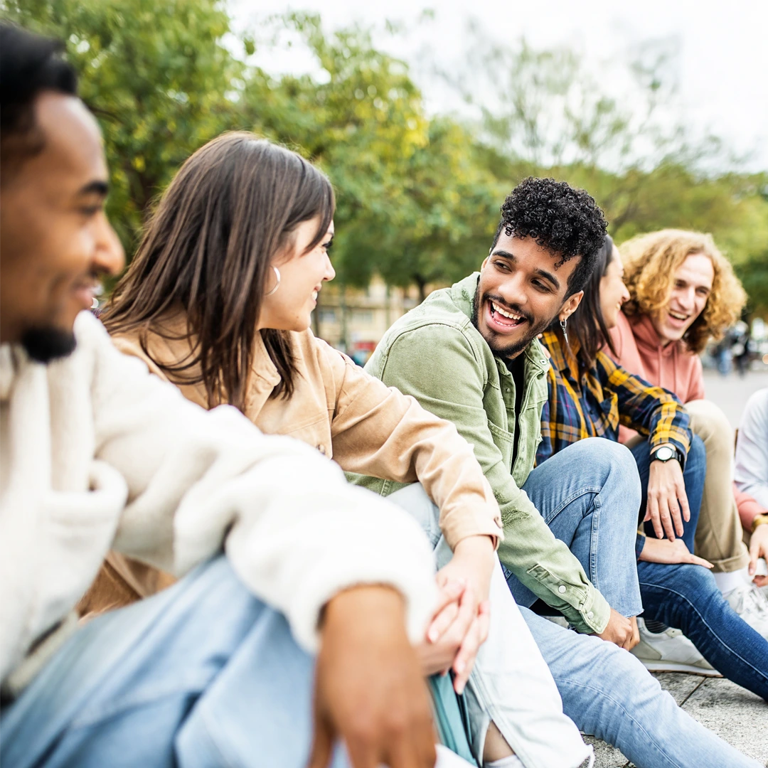 Young adults sitting together, showing peer support in residential treatment at Changes.